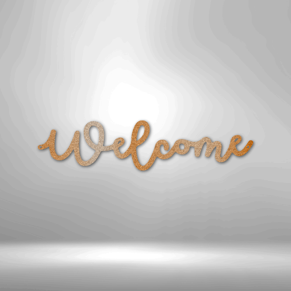 Cursive wooden ’Welcome’ sign in a warm golden color.