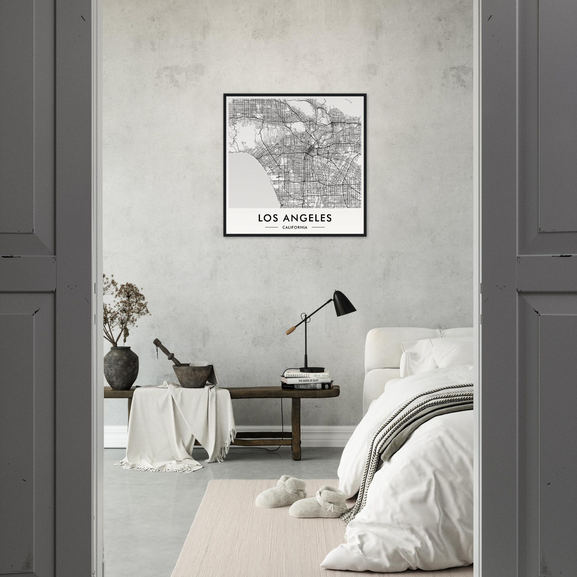 Framed map of Los Angeles hanging on a white wall.