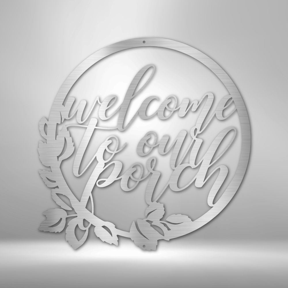 Circular wall decoration with cursive text reading ’welcome to our porch’ and floral accents.