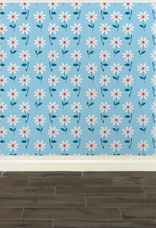 Floral patterned wallpaper with white daisies on a light blue background.