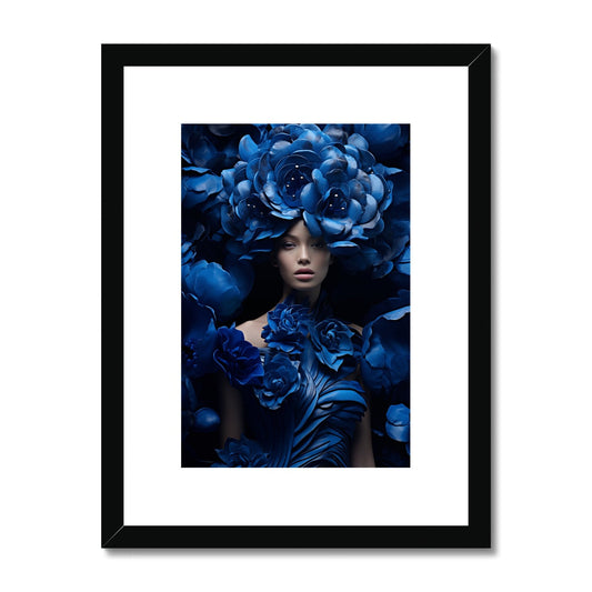 Framed artwork featuring a surreal portrait surrounded by vibrant blue flowers.