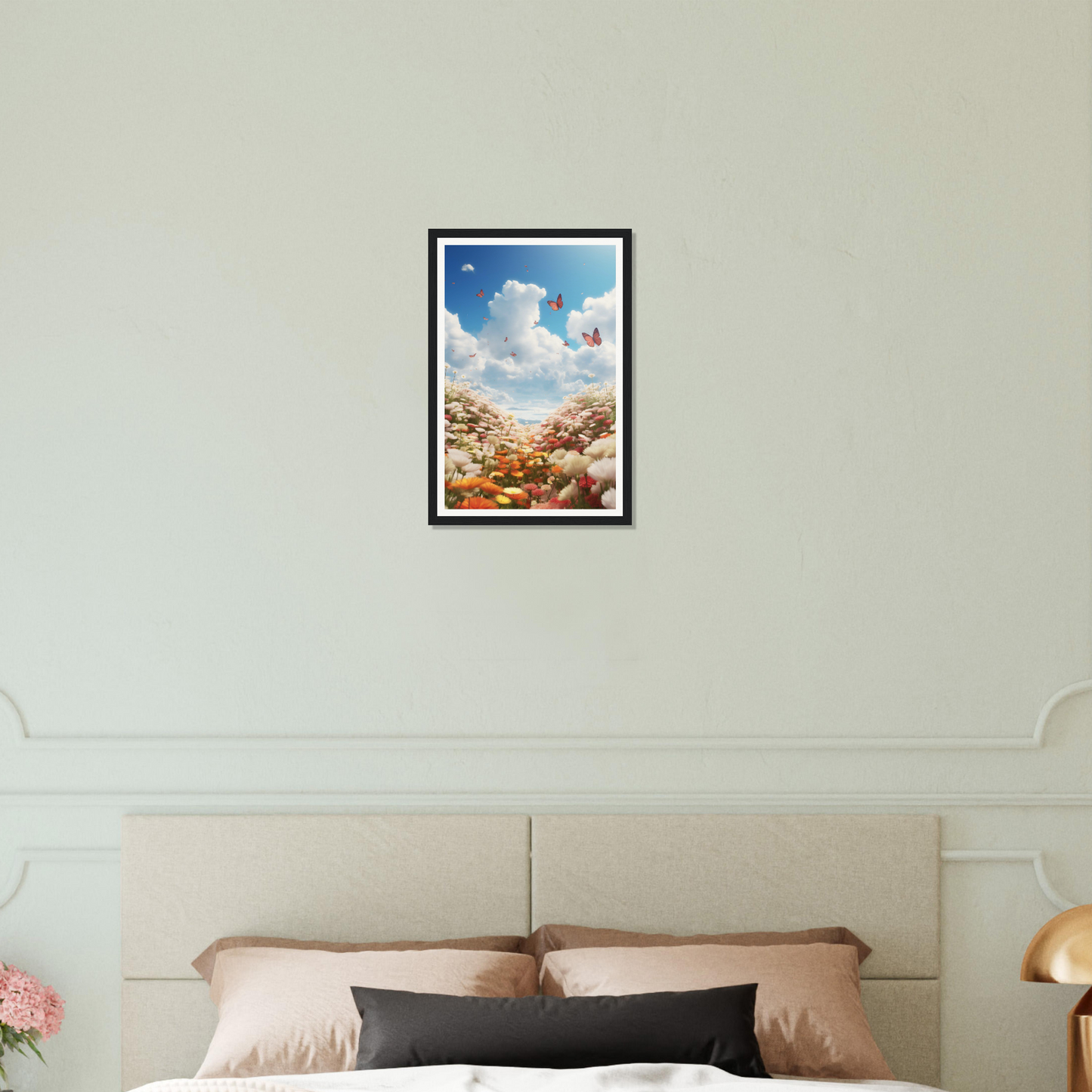 A bed with a white comforter and a painting on the wall