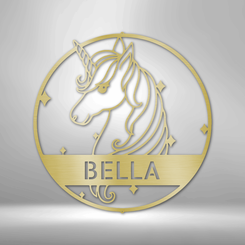 Circular gold-colored unicorn design with the name ’BELLA’ underneath.