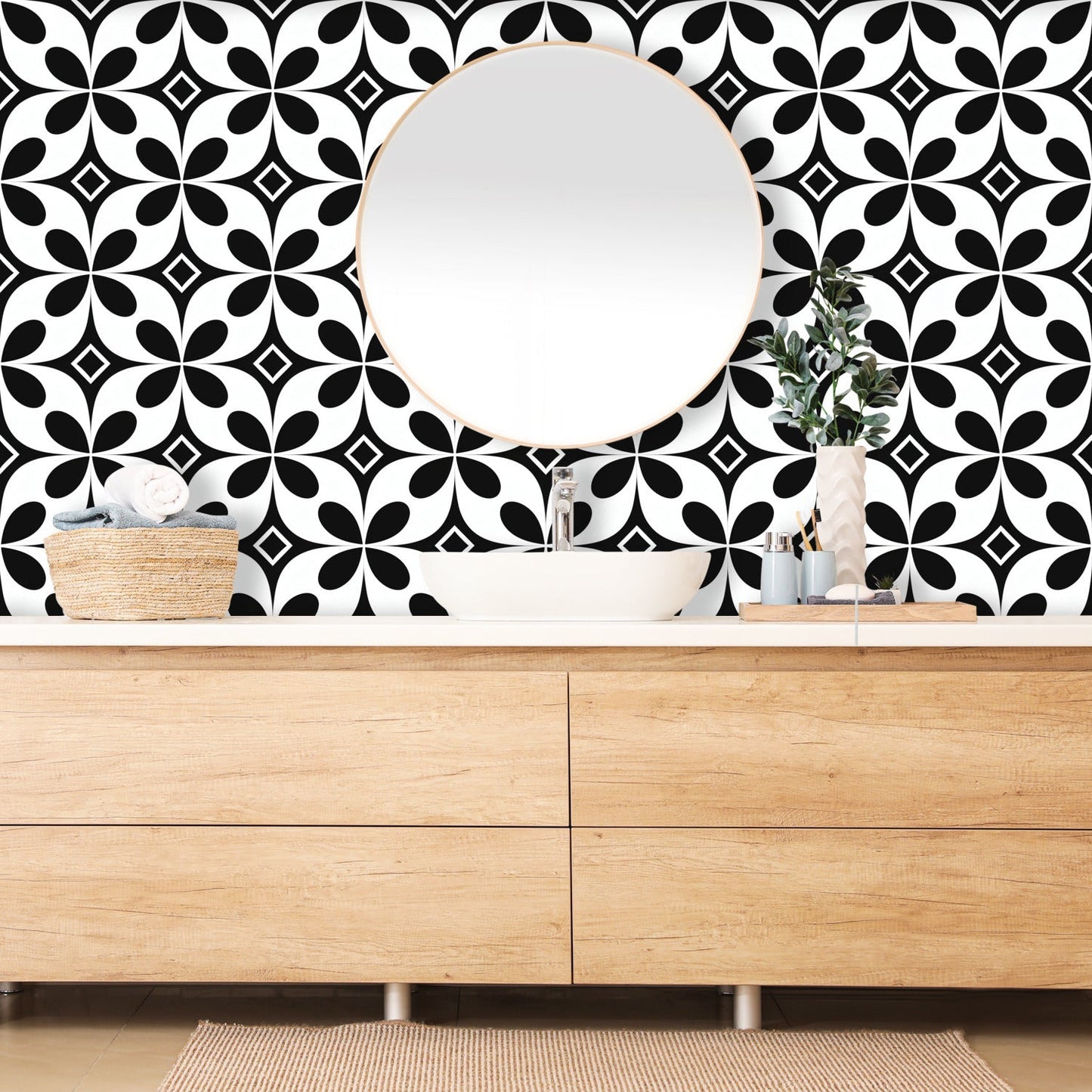 A black and white geometric wallpaper with a circular pattern