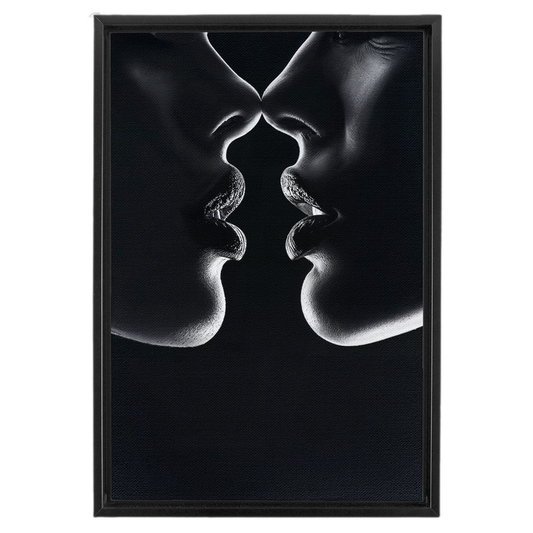 A black and white photo of two people kissing