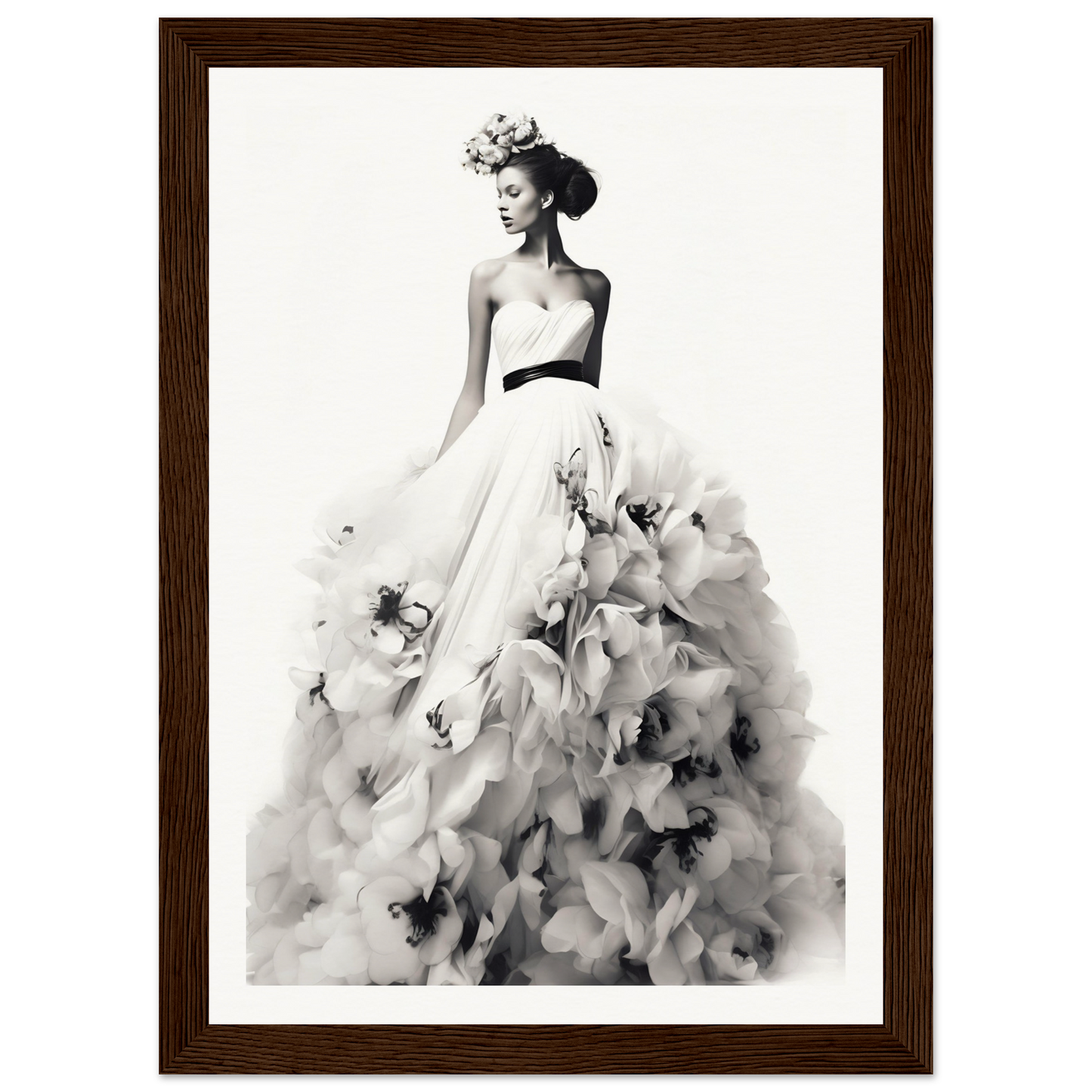 A black and white photo of a woman in a dress with flowers