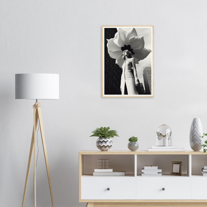 A black and white photo of a woman with a flower in her hair framed on a wall