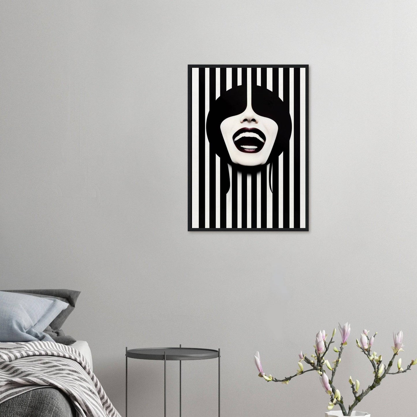 A black and white striped wall with a woman’s face in the middle