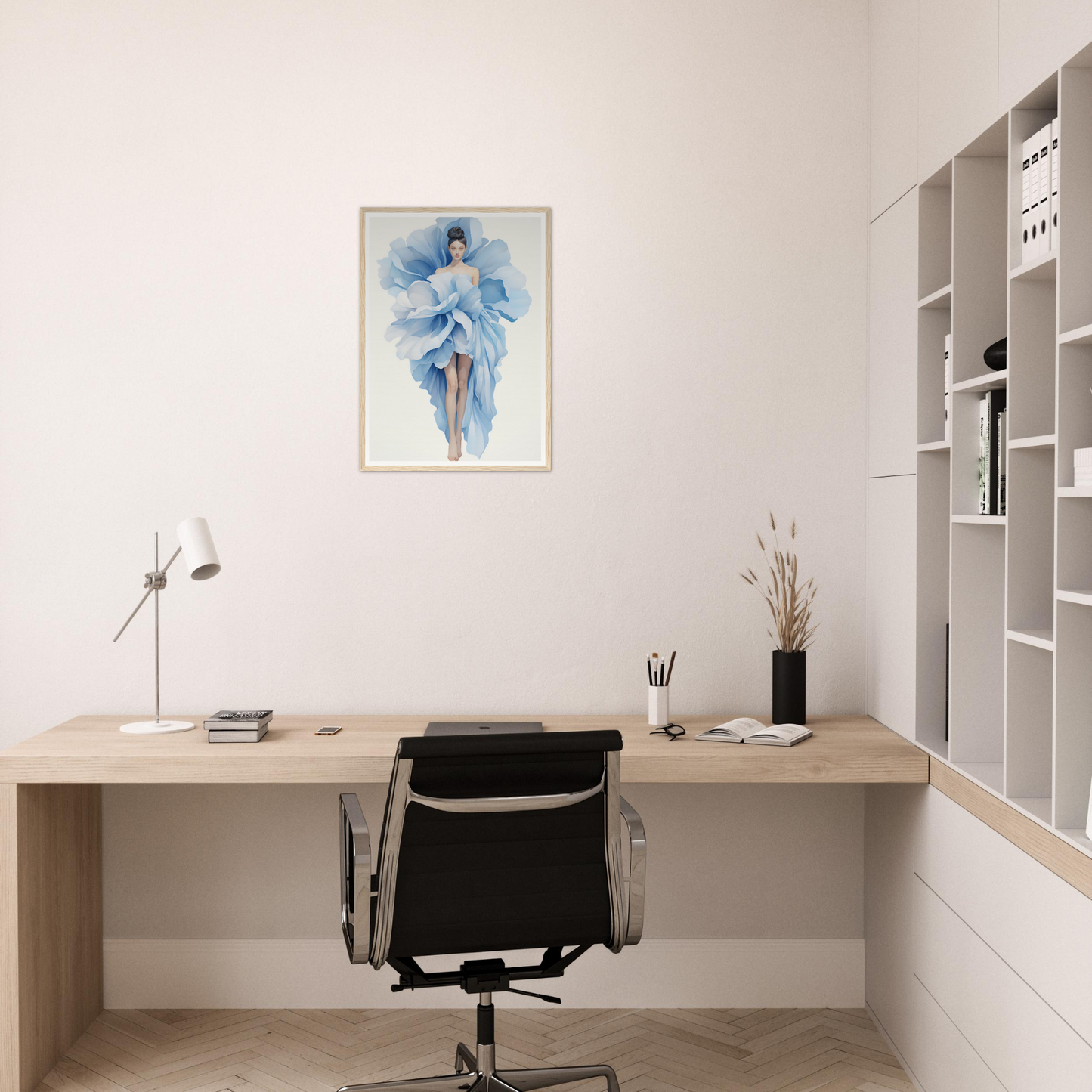 A blue flower on a white wall above a desk