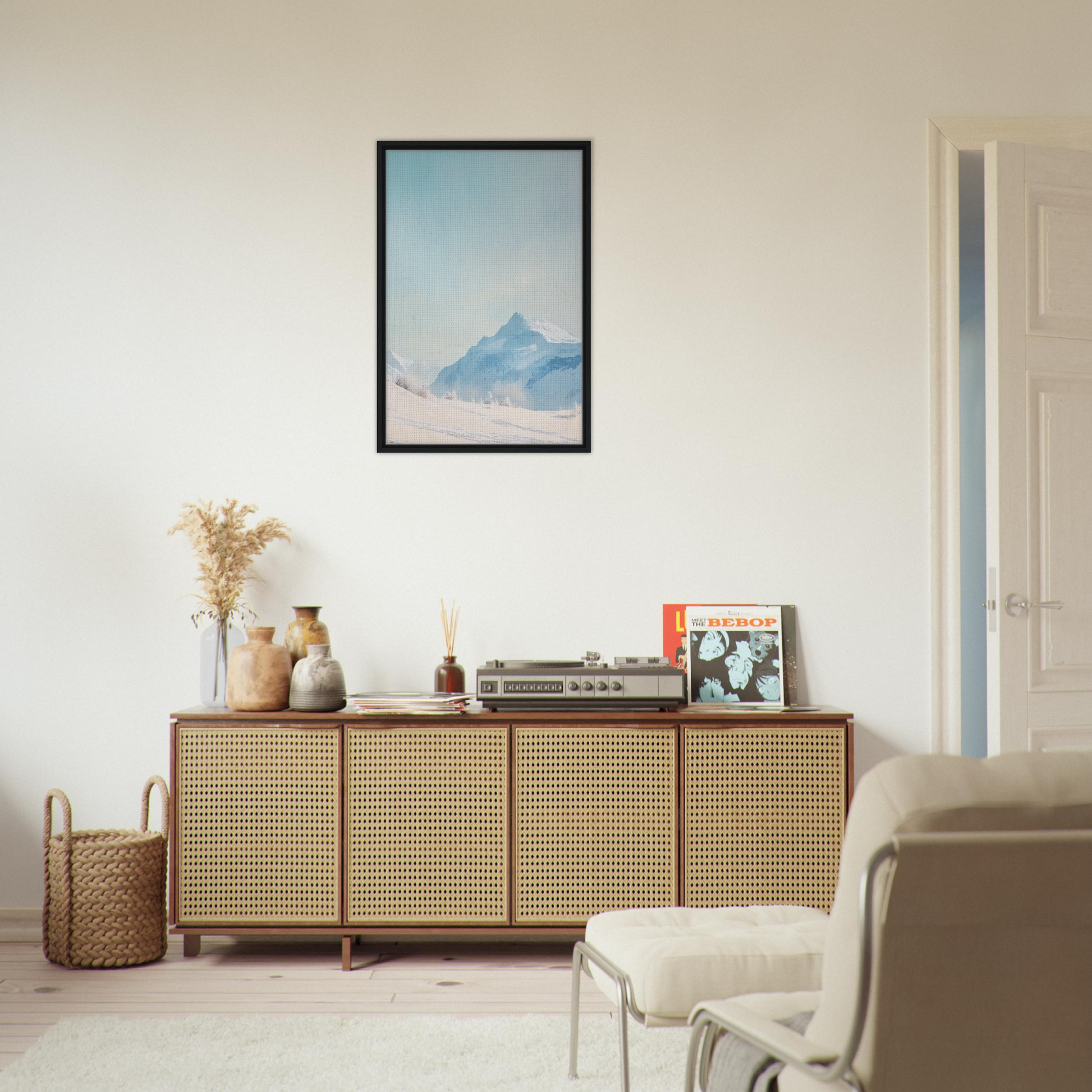 Wooden sideboard with cane-webbed doors and decorative items for Blue Solitude Serenade