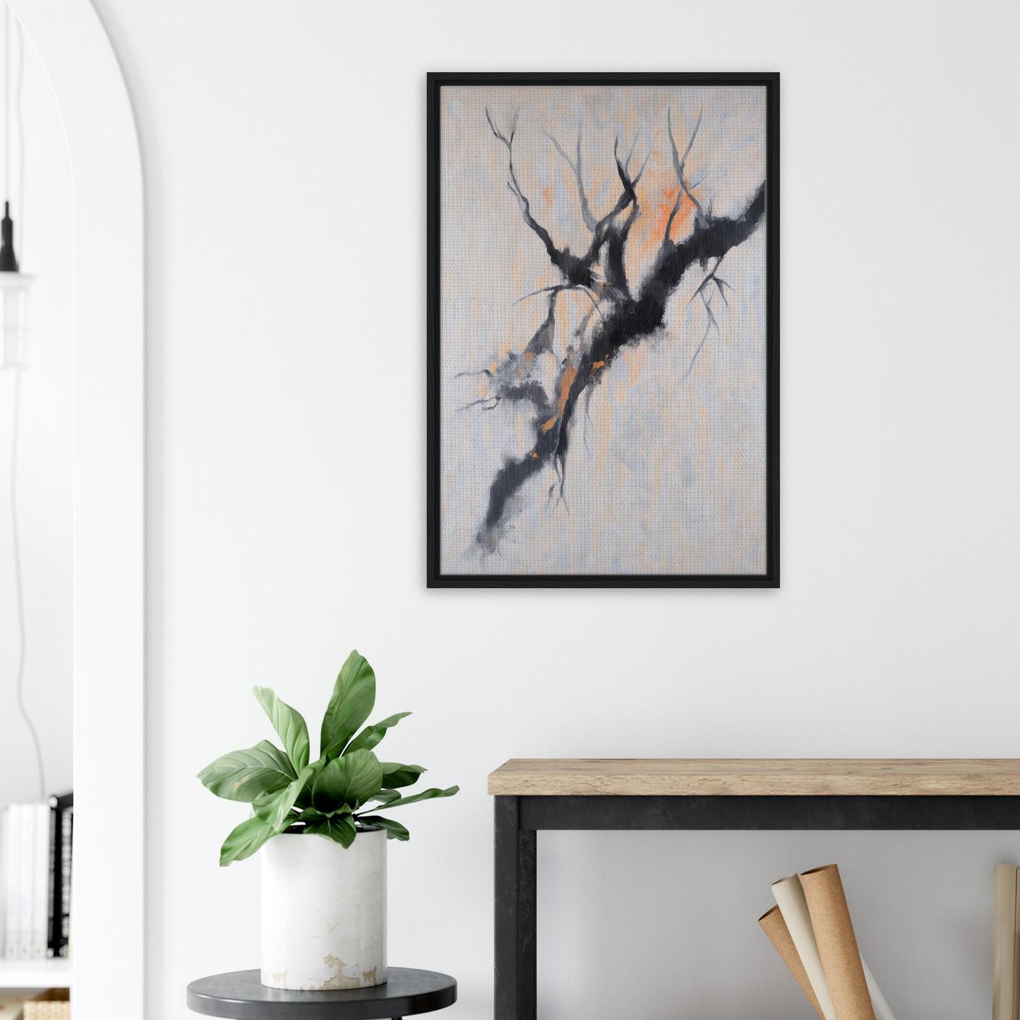 Framed canvas print of Branches’ Mirage Serenity with a bare tree branch on a pale backdrop