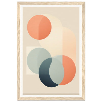 Abstract geometric artwork featuring overlapping circles in muted pastel colors framed in a light wooden frame.