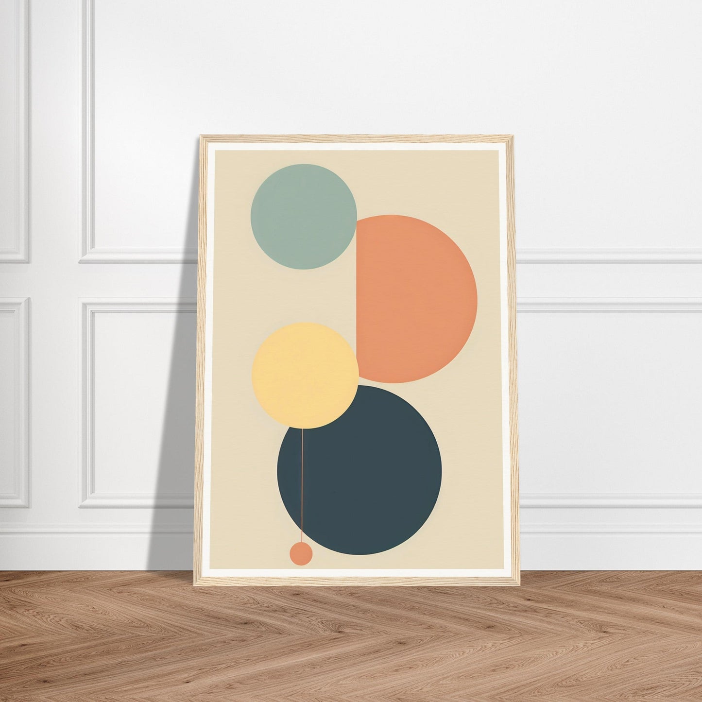 Framed abstract art print featuring geometric circles in muted colors.