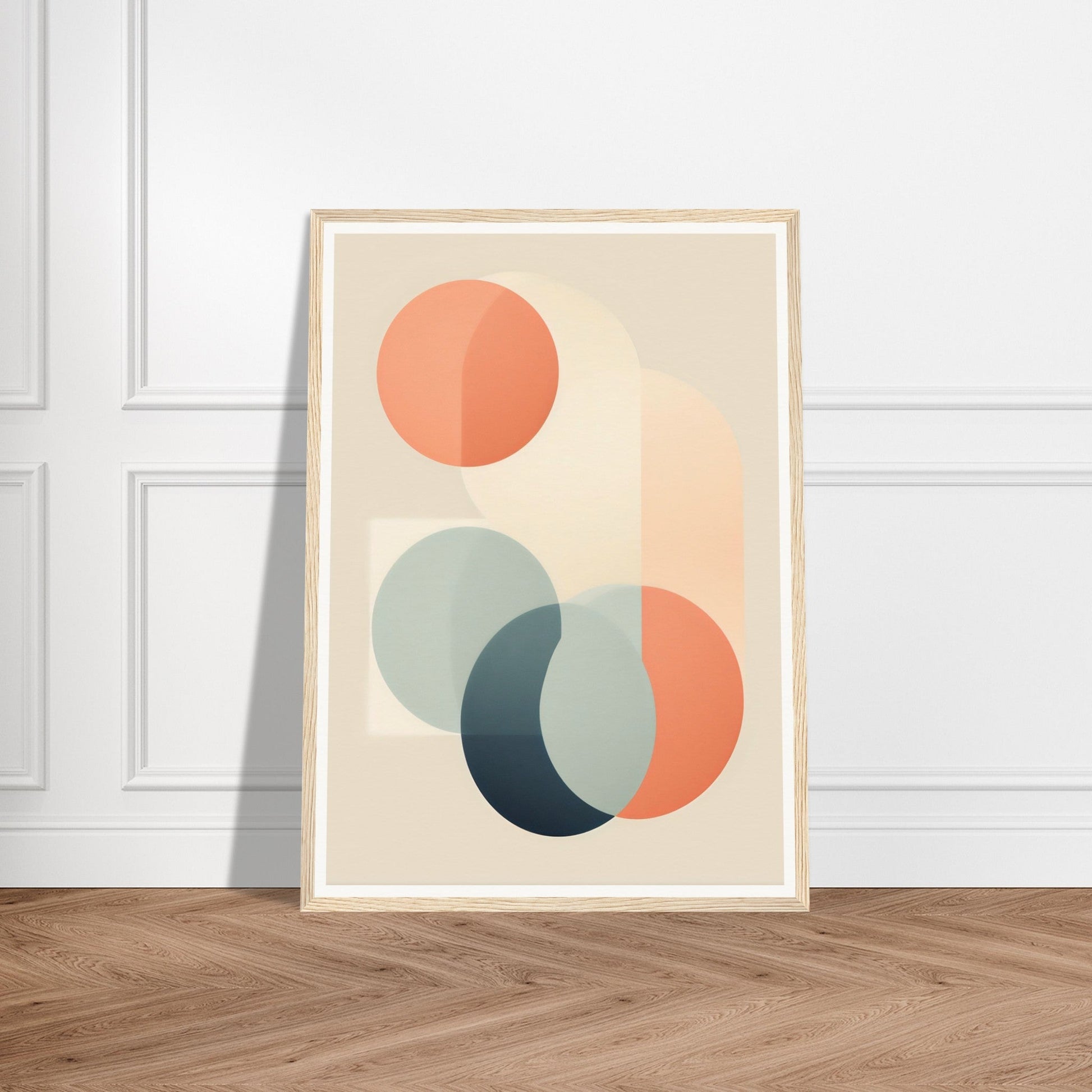 Framed abstract art print featuring overlapping circular shapes in muted colors.