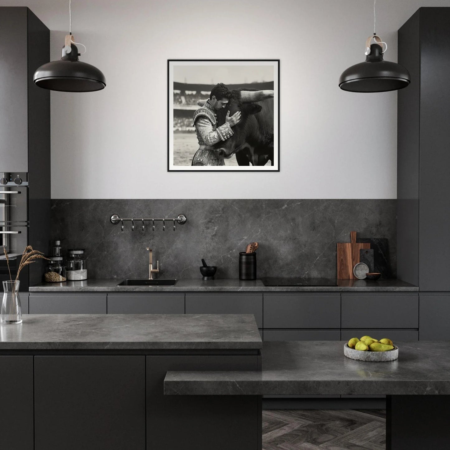 Modern dark gray kitchen featuring Bull & Brave framed wall art and sleek black pendant lights