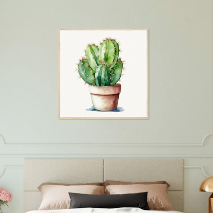 A cactus plant in a pot on a bed