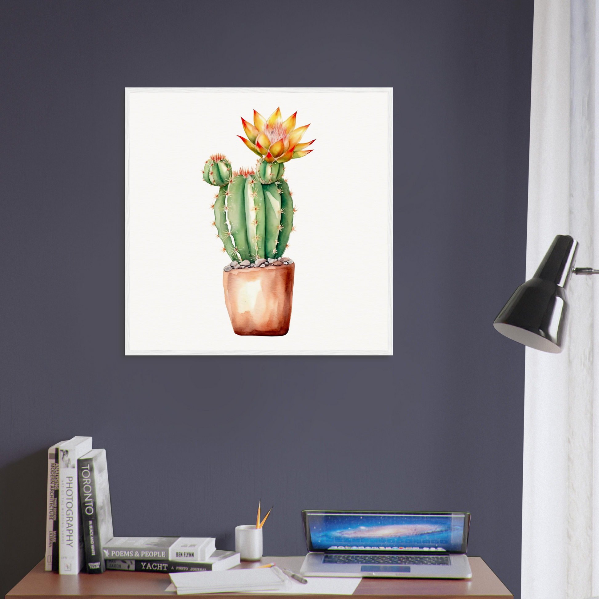 A cactus plant in a pot on a desk