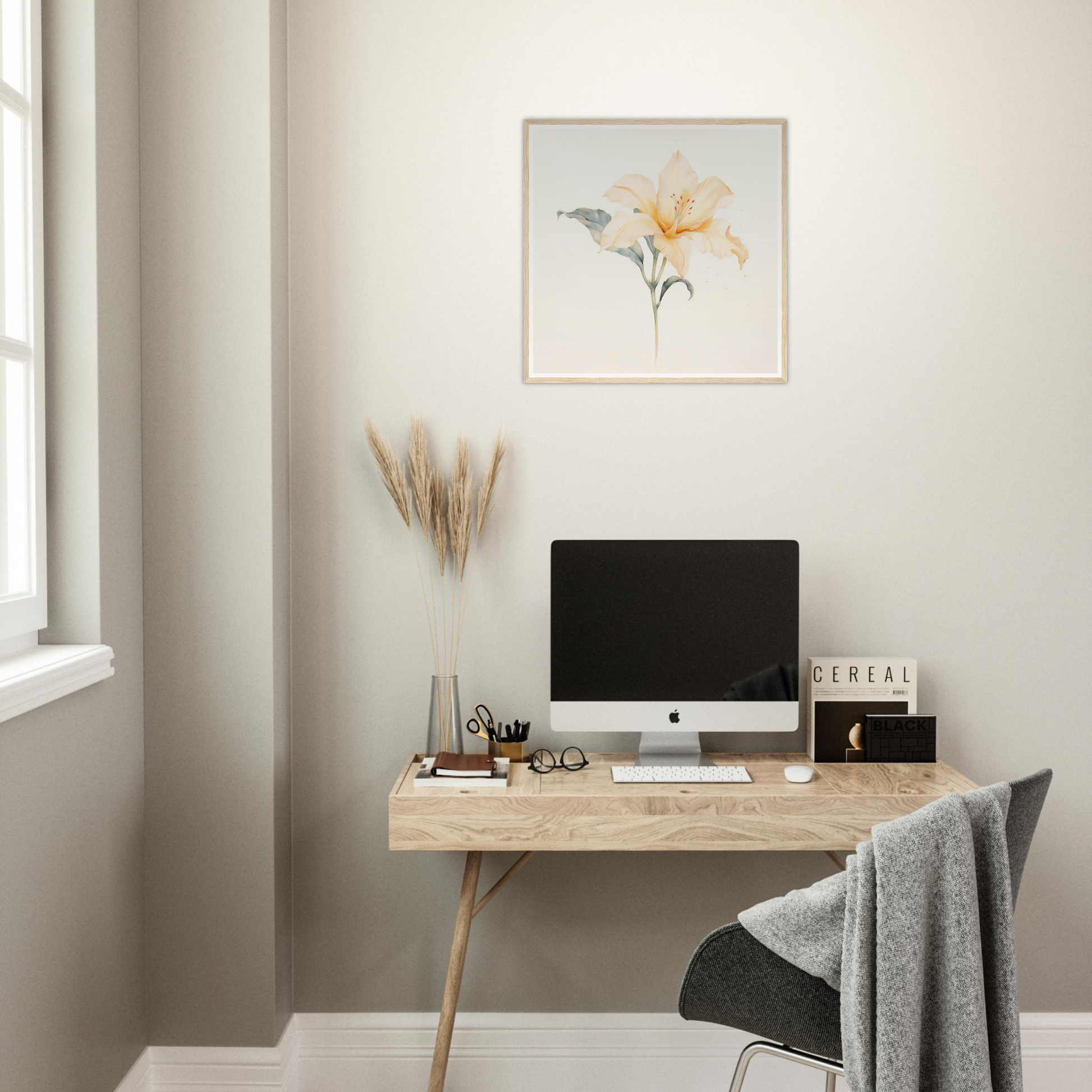 Minimalist wooden desk with a computer monitor and office accessories.