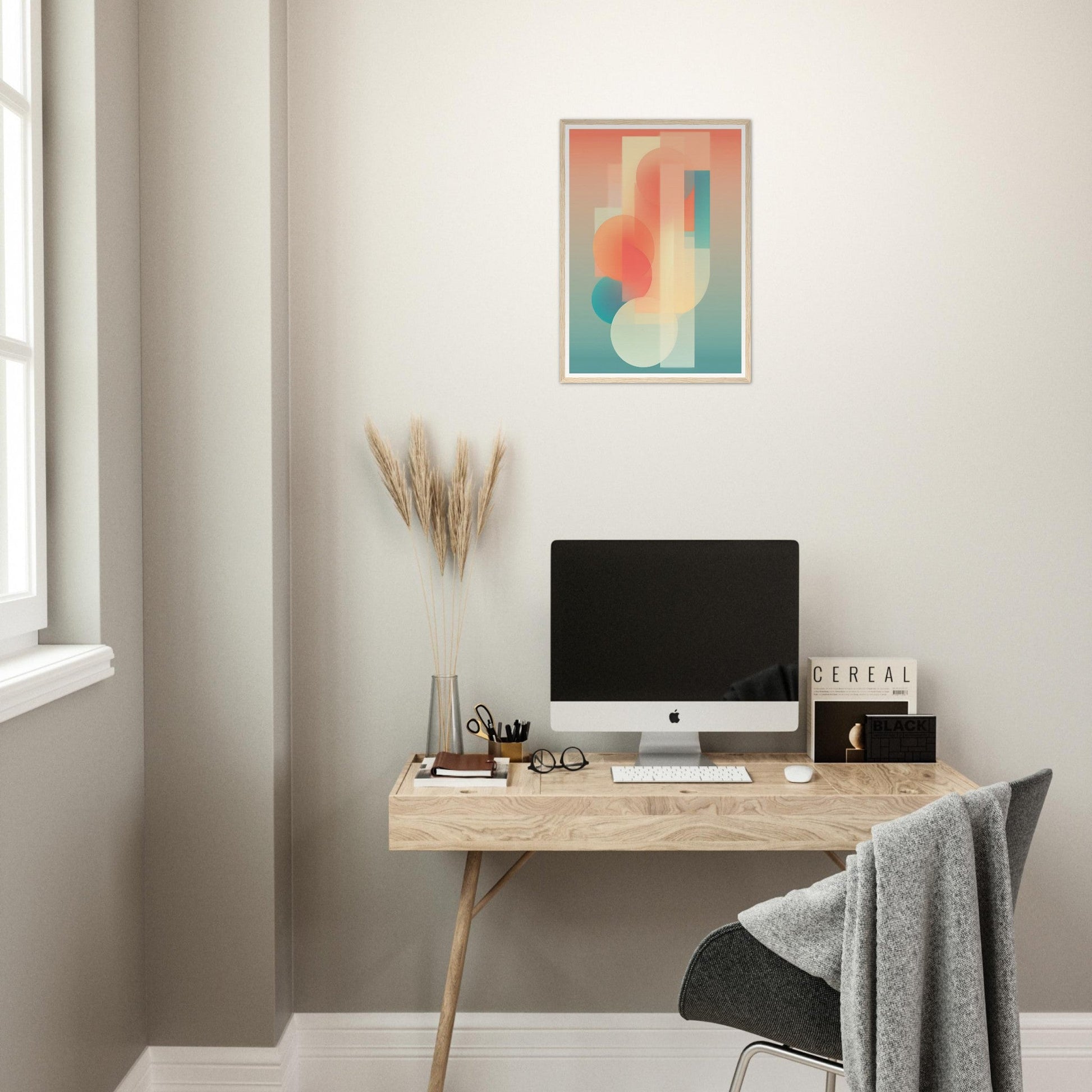 Wooden desk with a computer monitor and office accessories.