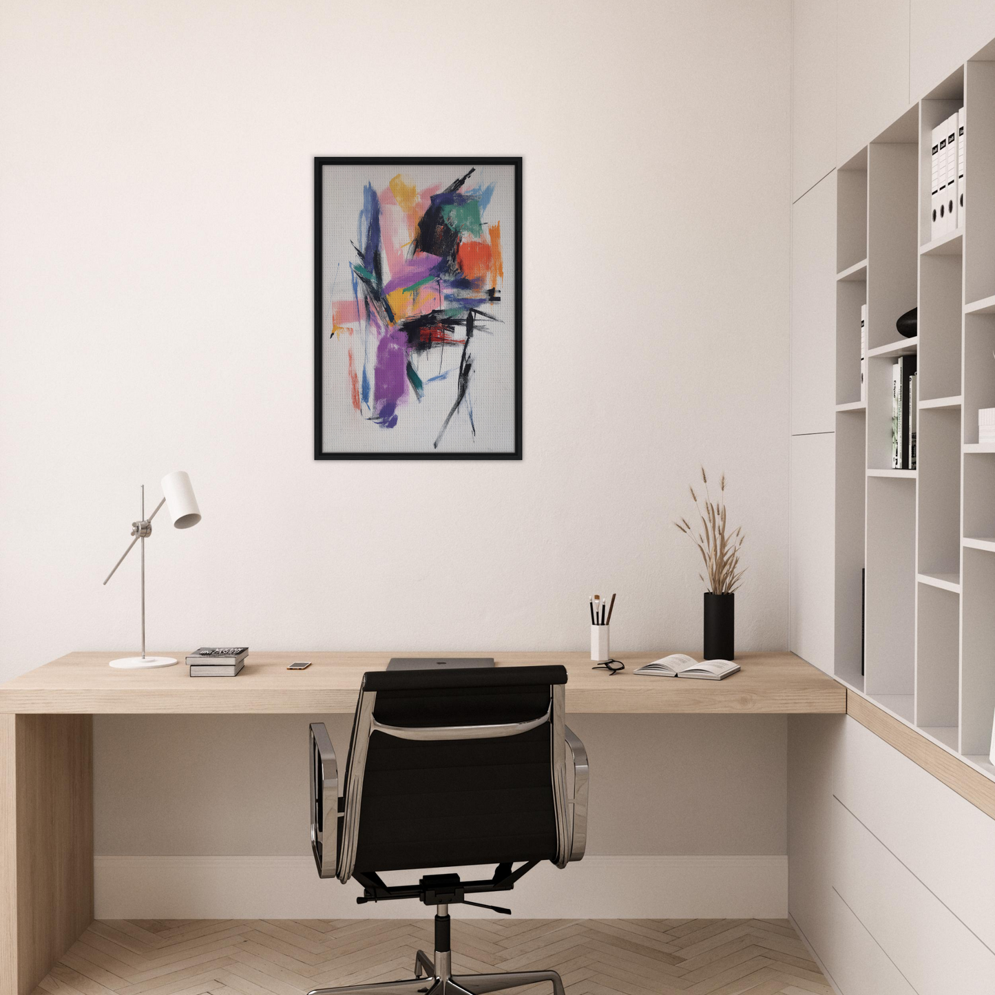 Minimalist home office with wooden desk, chair, and Chaos Color Waltz framed canvas art