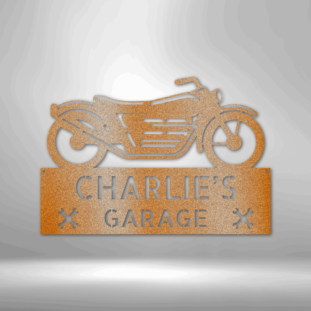 Metal sign featuring a motorcycle silhouette above the text ’CHARLIE’S GARAGE’.