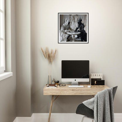 Minimalist wooden desk with an iMac and pampas grass for Chess Duality Dance art