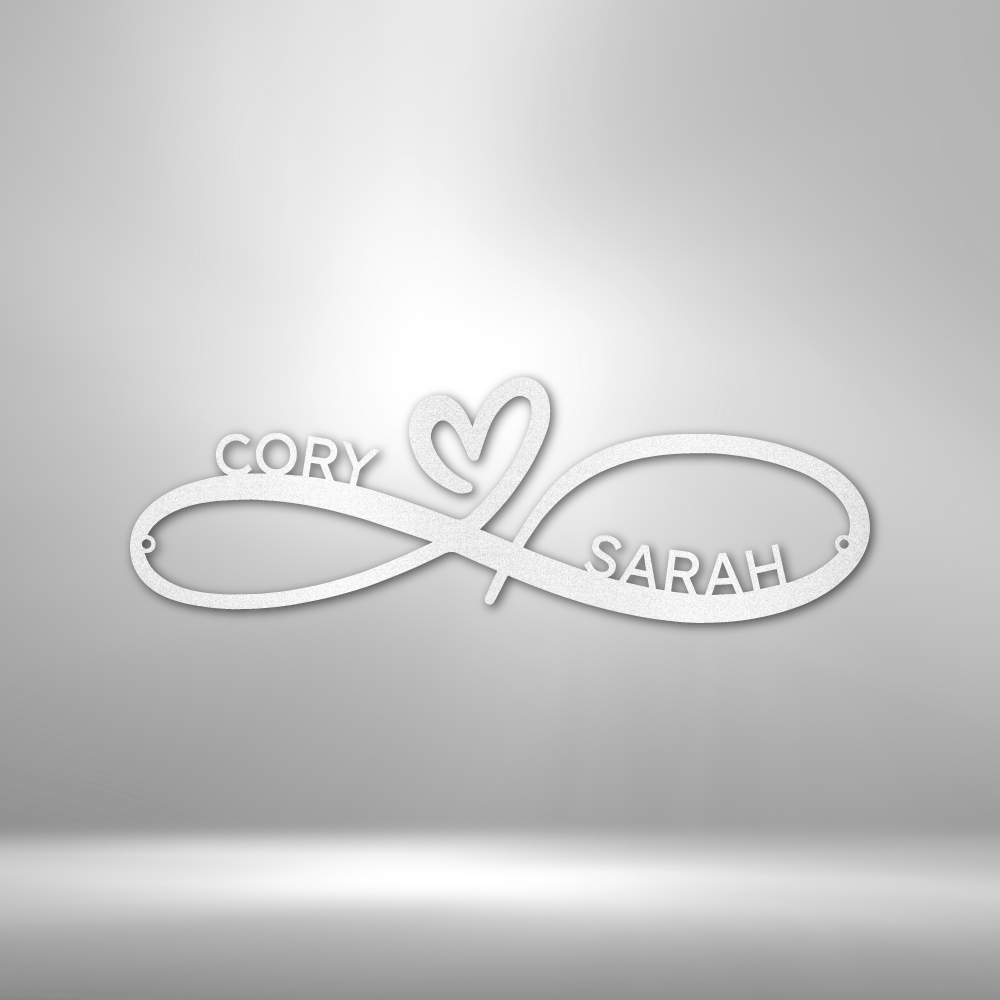 Infinity symbol with names ’Cory’ and ’Sarah’ and a heart shape incorporated into the design.