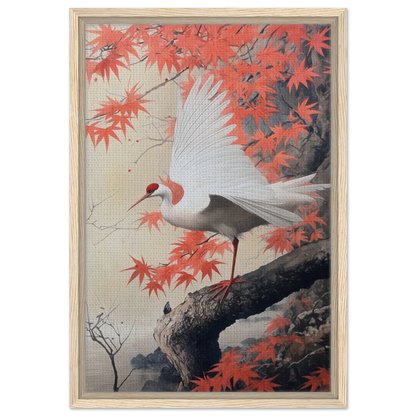 White crane on a tree branch among red maple leaves in Crimson Crane Reverie framed canvas print