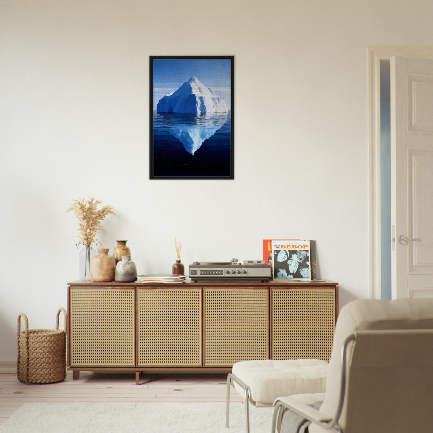 Framed canvas art of a blue iceberg reflecting in water for Crystalline Lull room decor