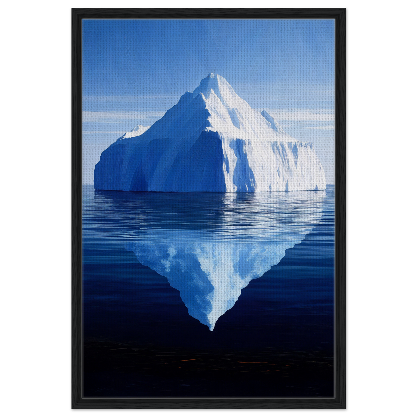 Iceberg with triangular peak reflecting in calm blue water, part of Crystalline Lull framed canvas print