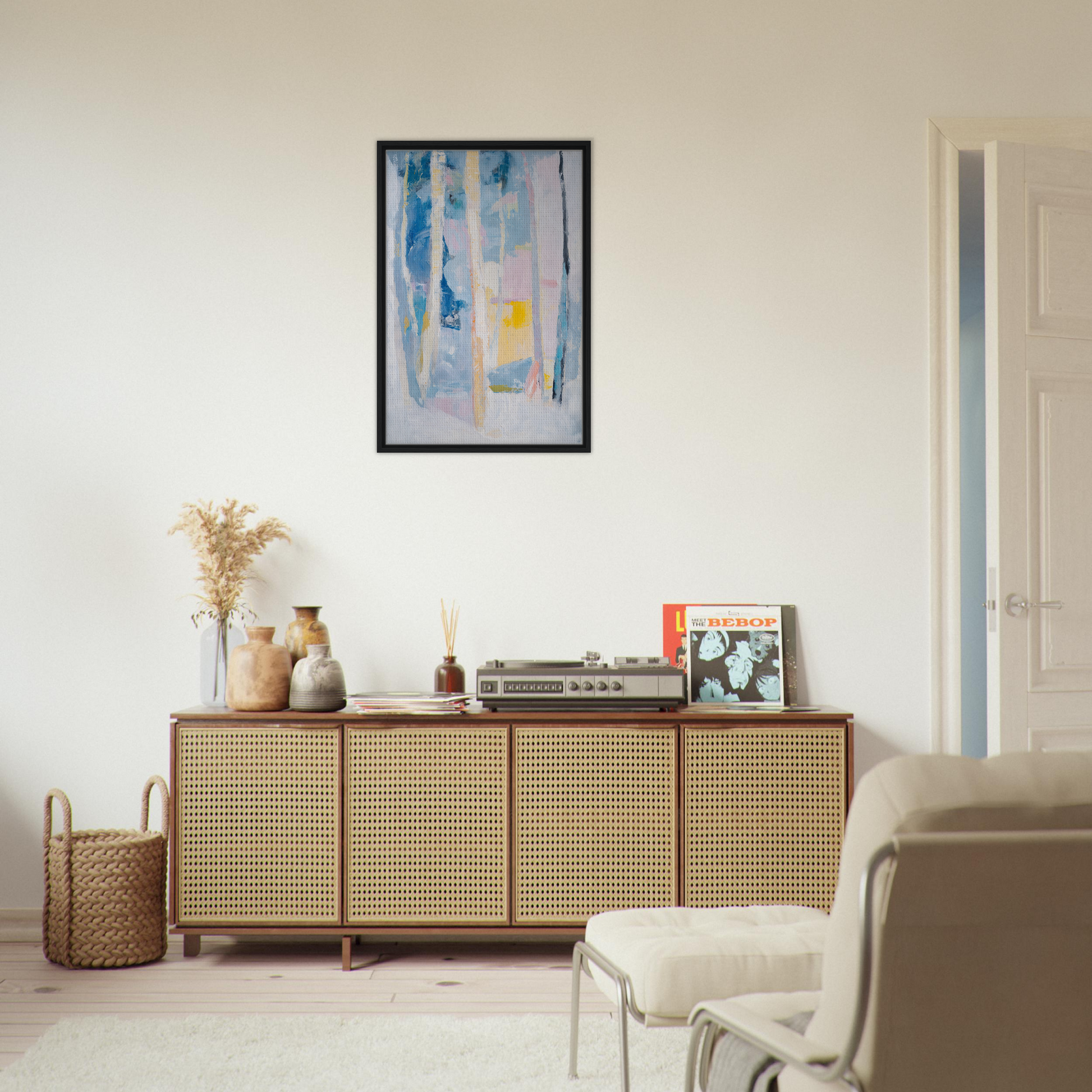 Wooden sideboard with cane-webbed doors and decorative items for Cyan Green Seclusions