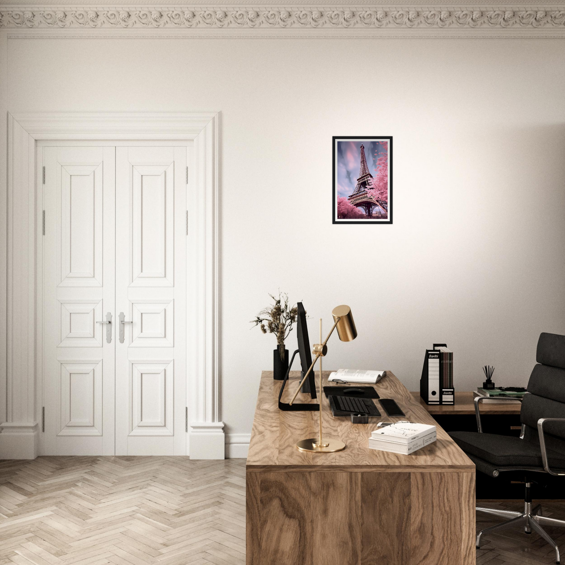 A desk with a chair and a framed picture on it