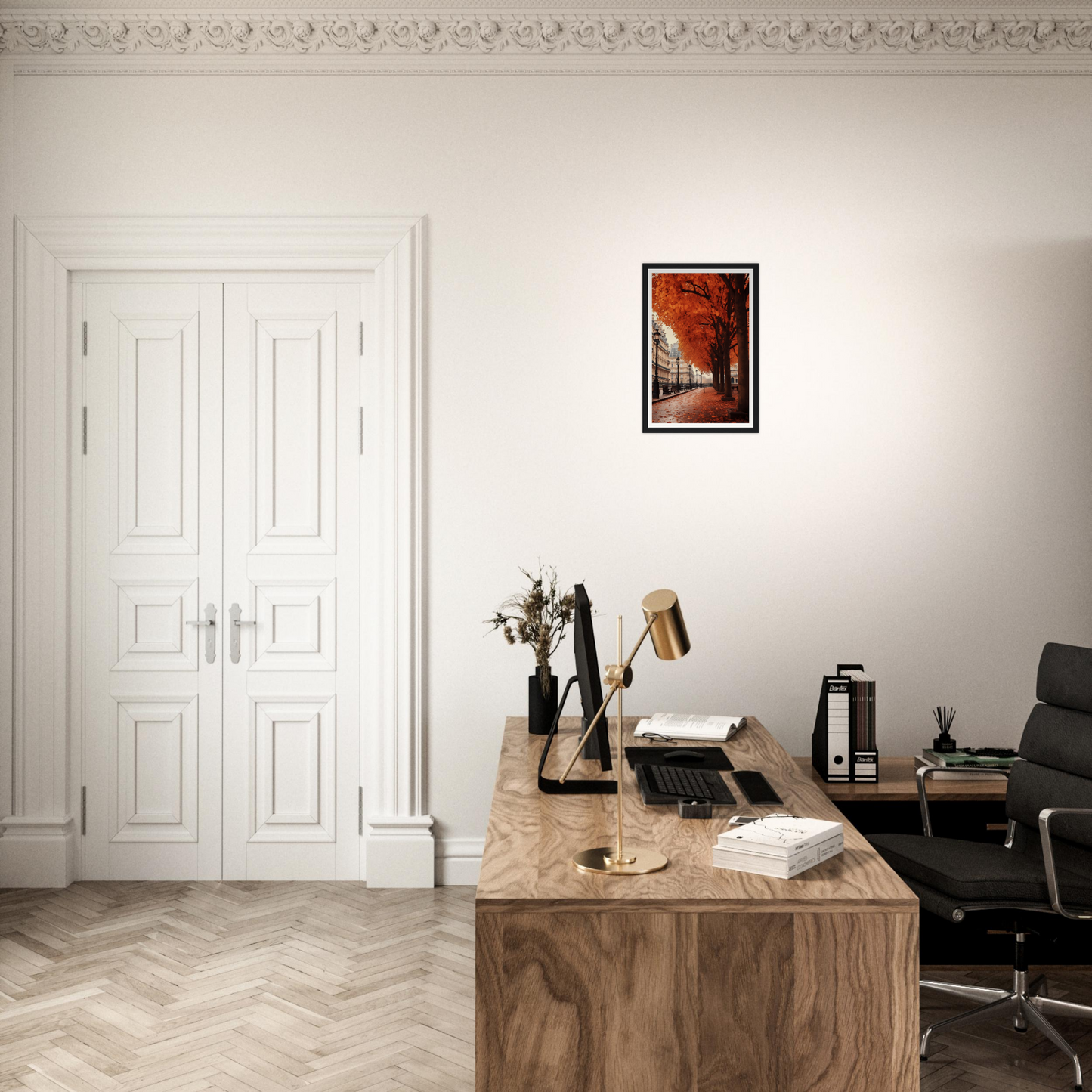 A desk with a chair and a framed picture on it