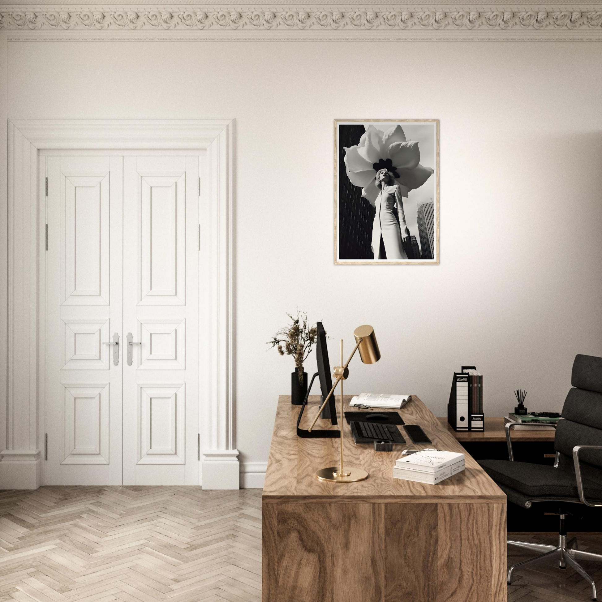 A desk with a chair and a painting on the wall