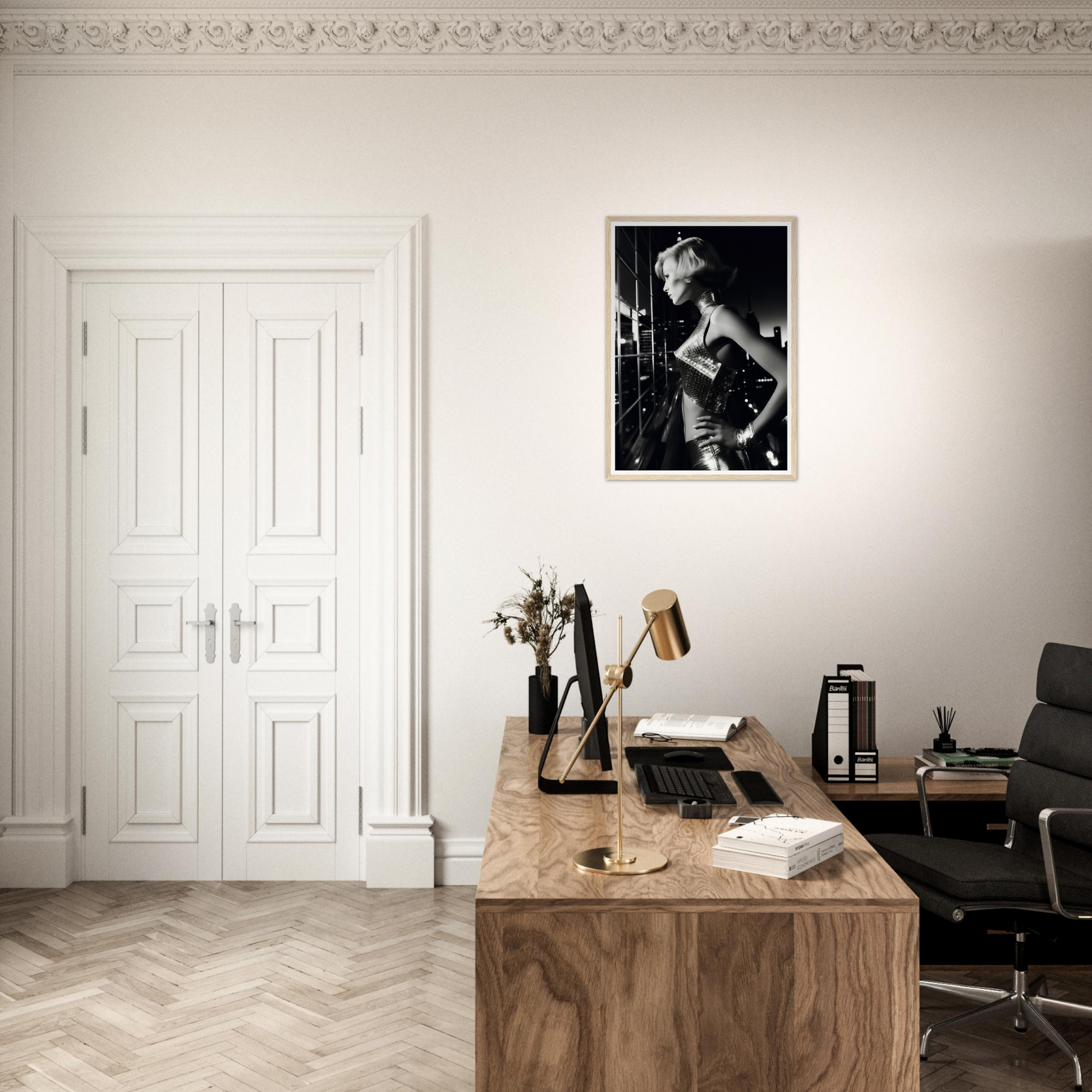 A desk with a chair and a picture on the wall