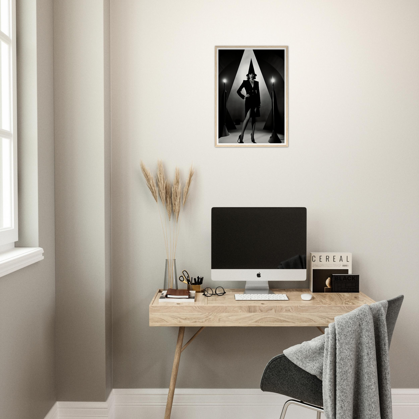 A desk with a computer and a chair