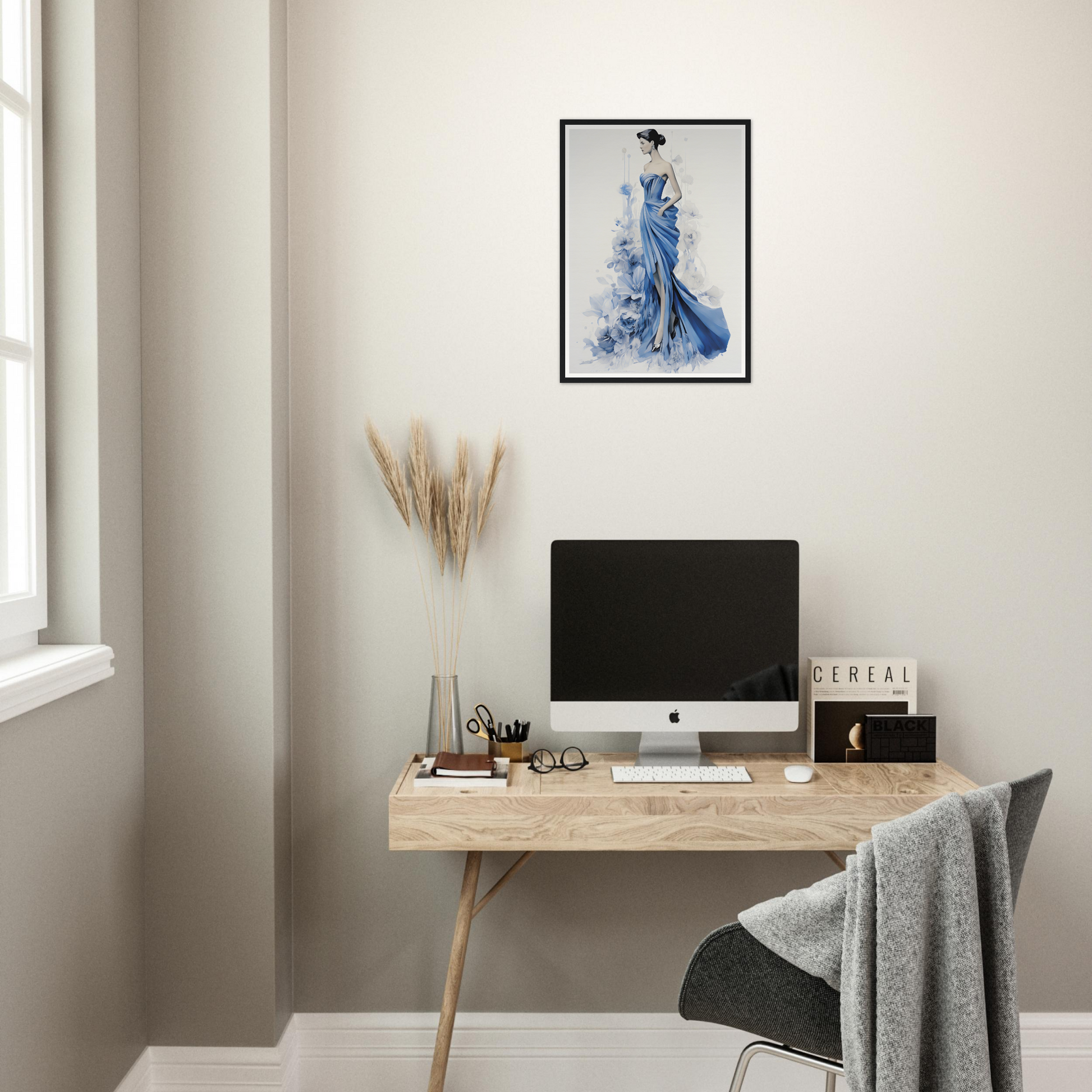 A desk with a computer and a chair