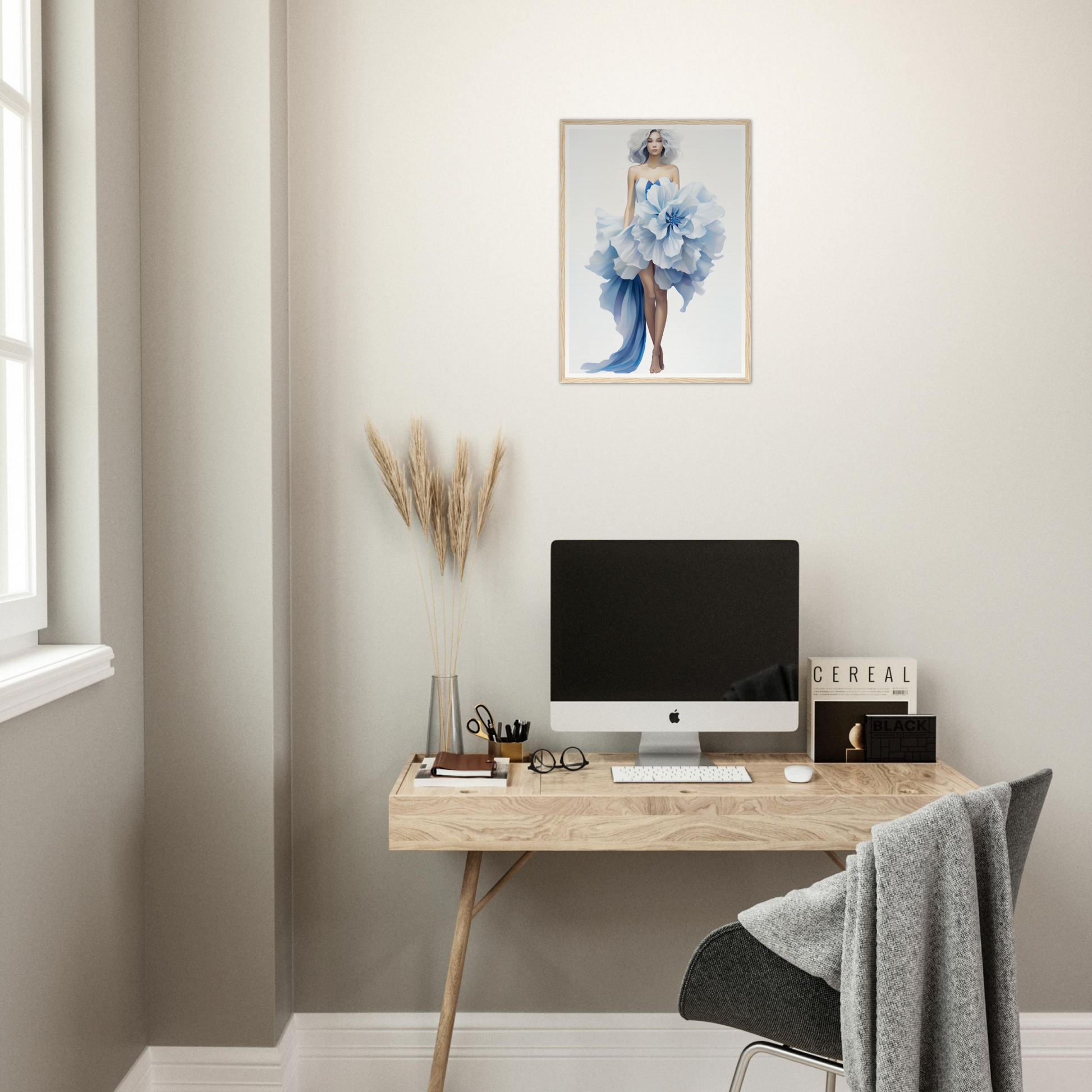 A desk with a computer and a plant