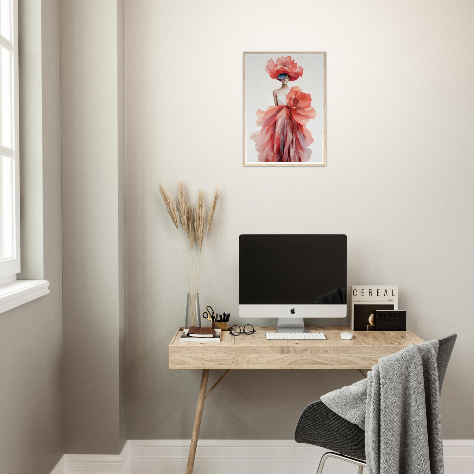 A desk with a computer and a plant