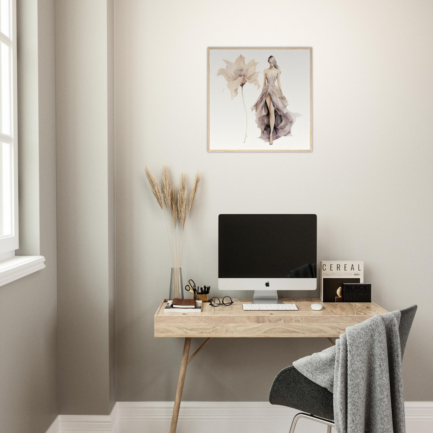 A desk with a computer and a plant on it