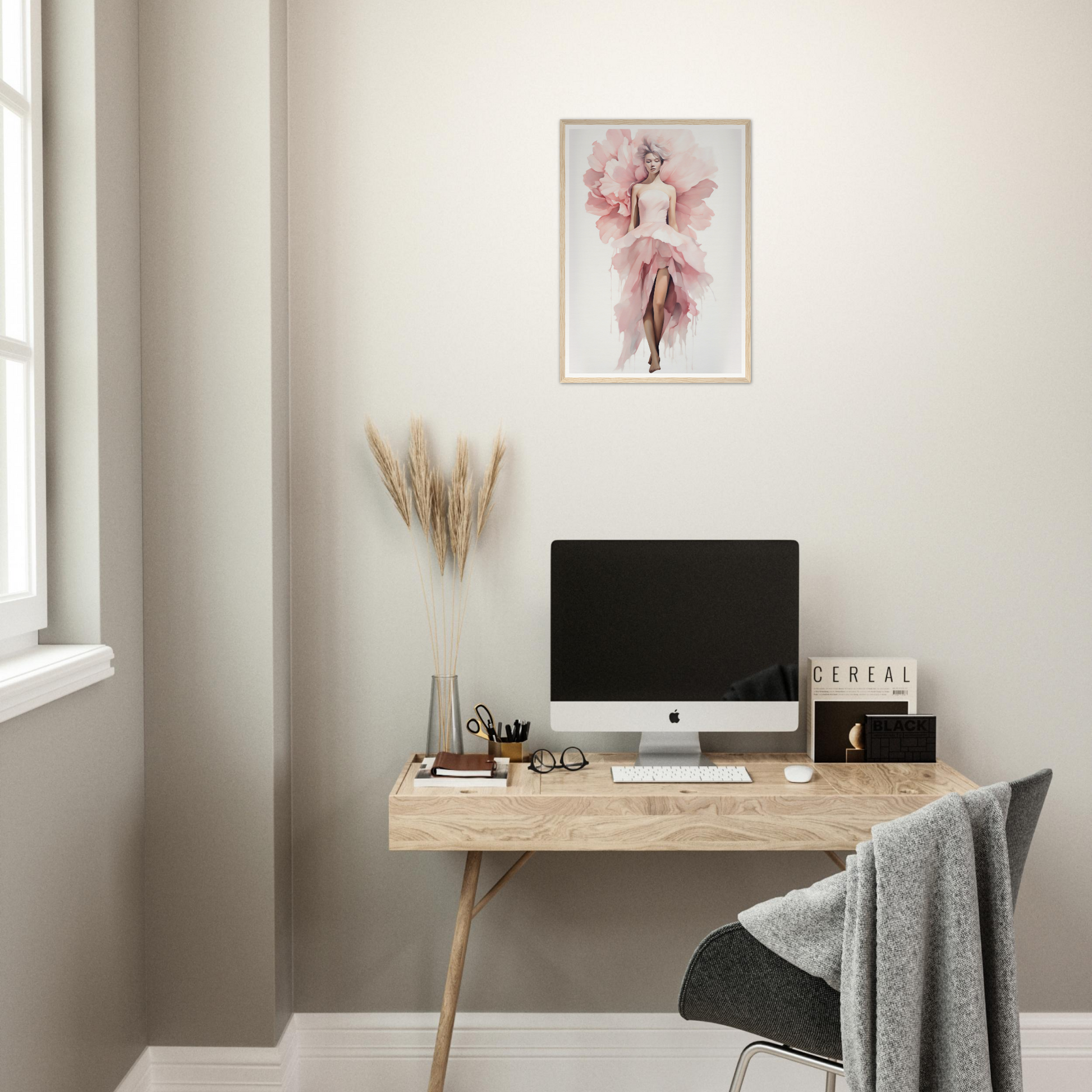 A desk with a computer and a plant on it