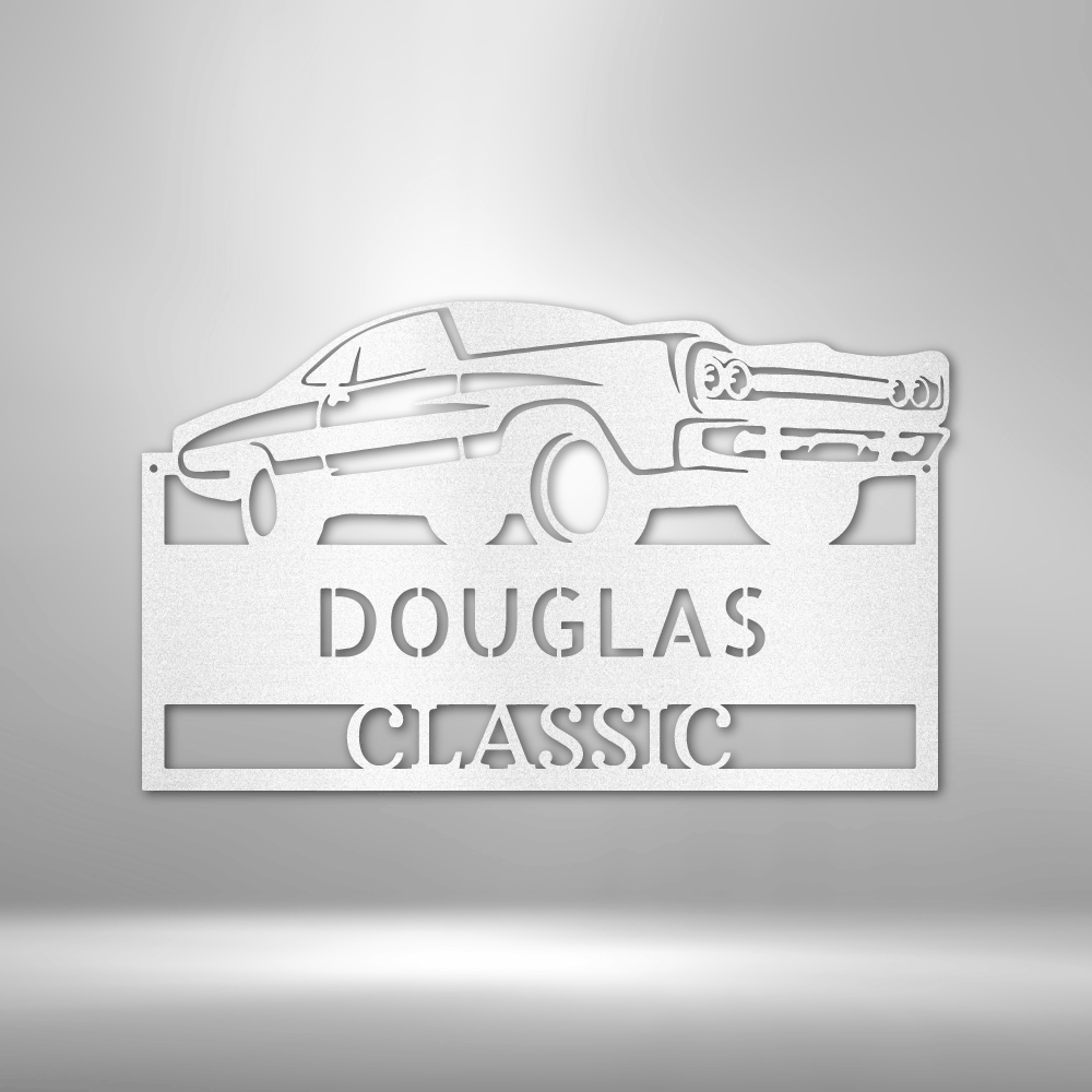 Embossed or raised metal plaque featuring a classic car design and the text ’DOUGLAS CLASSIC’.