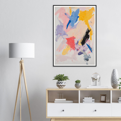 Framed wall art with bright colors above a modern console enhances the room decor.