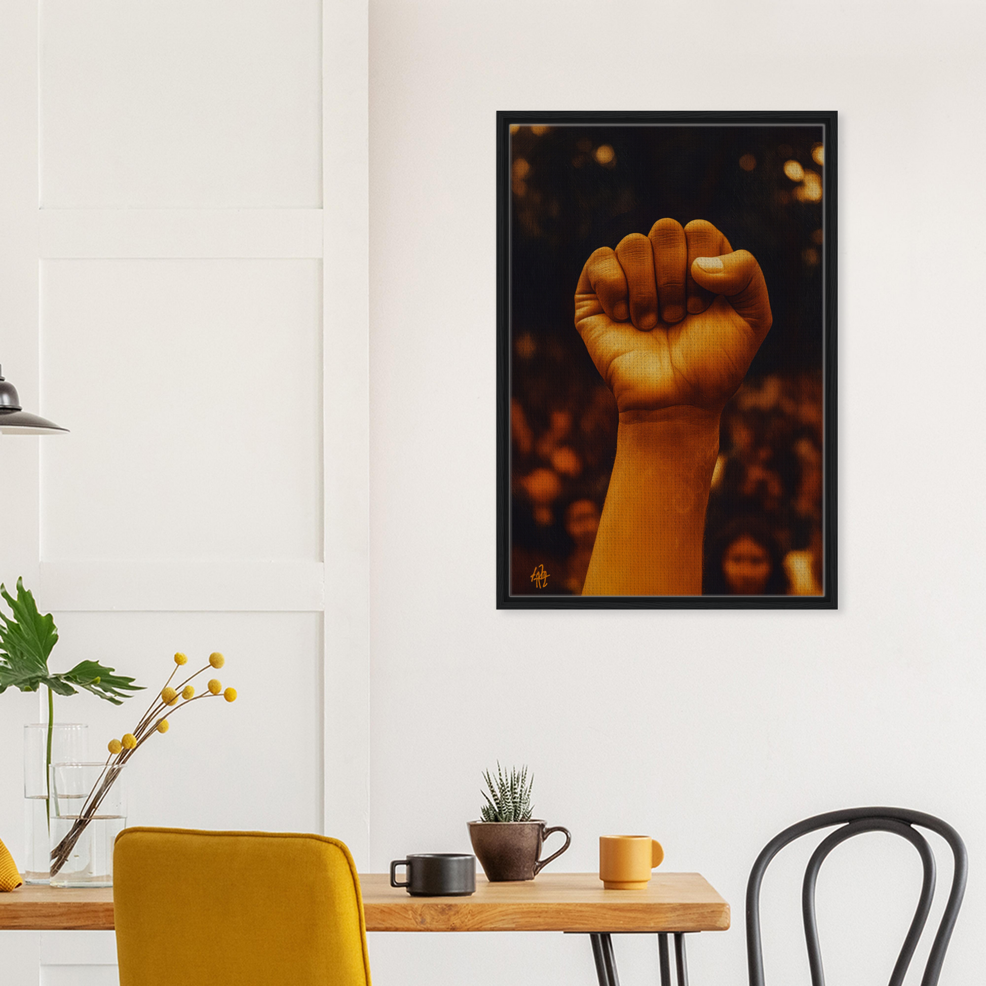 Framed canvas print of a raised fist symbolizing earthy defiance on a warm background