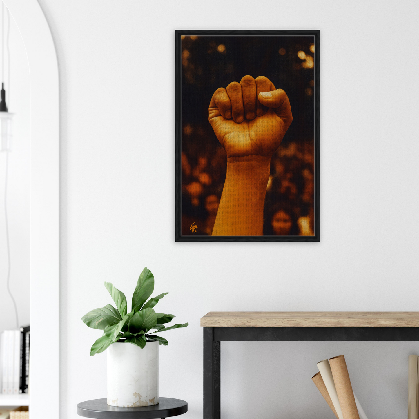 Raised fist in warm light representing Earthy Defiance, featured in Defiance Resonate framed canvas print