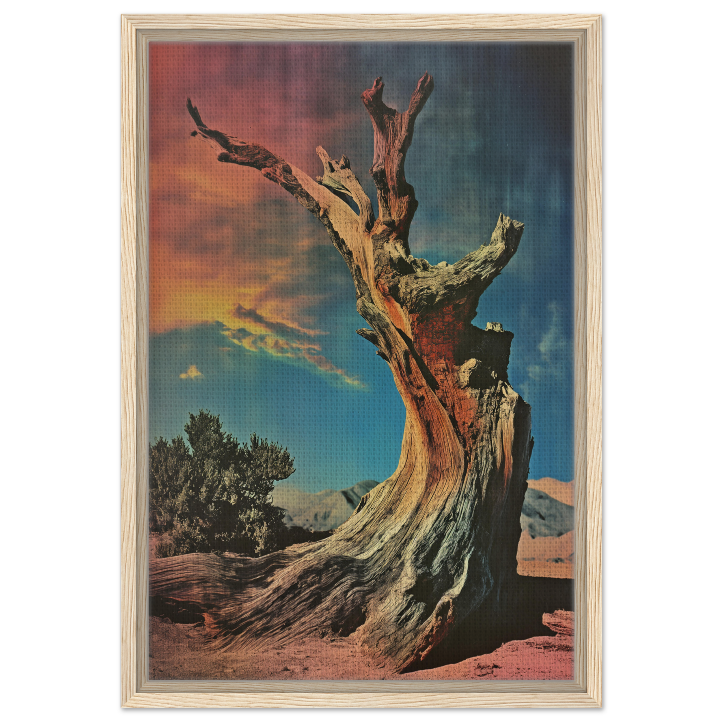 Gnarled dead tree with bare branches under colorful sky in Ecstatic Tree Reverie framed canvas print