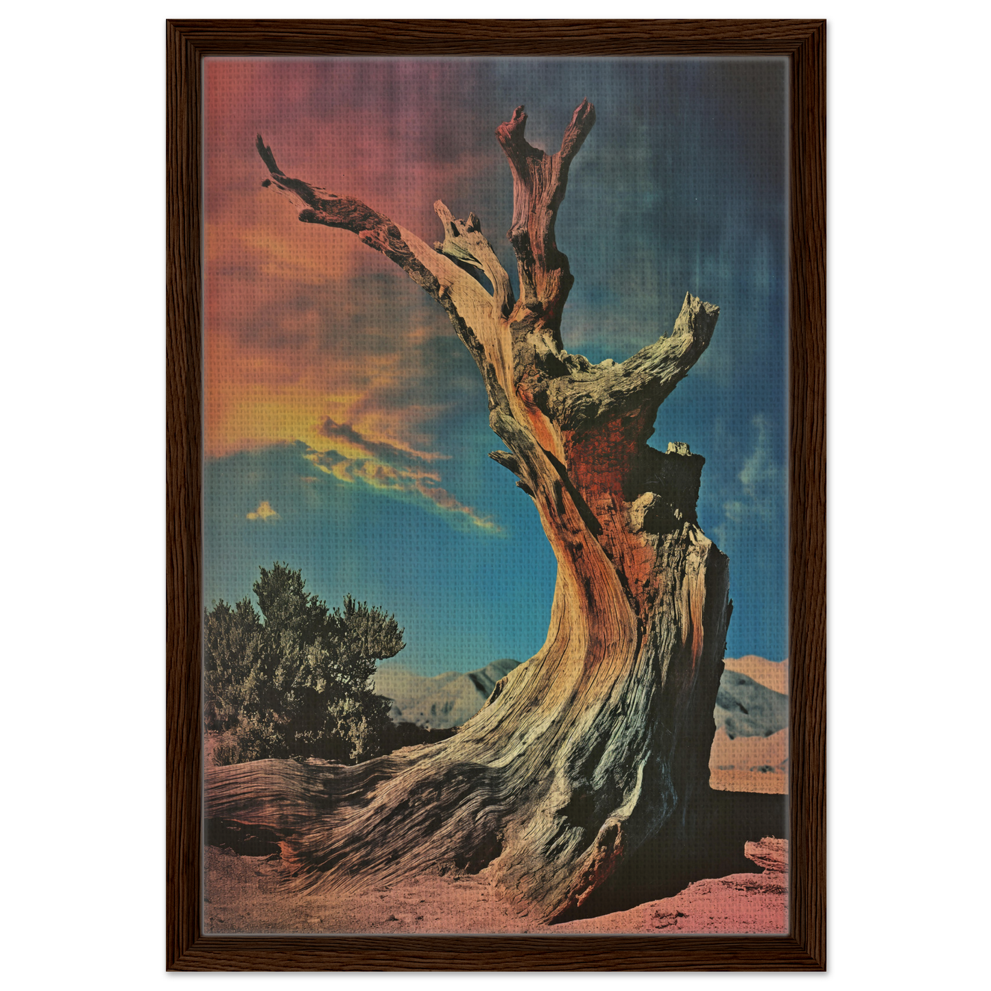 Gnarled dead tree trunk against a colorful sky in Ecstatic Tree Reverie canvas print