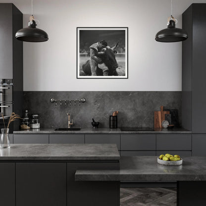 Modern dark gray kitchen featuring industrial pendant lights and a special edition art™ piece