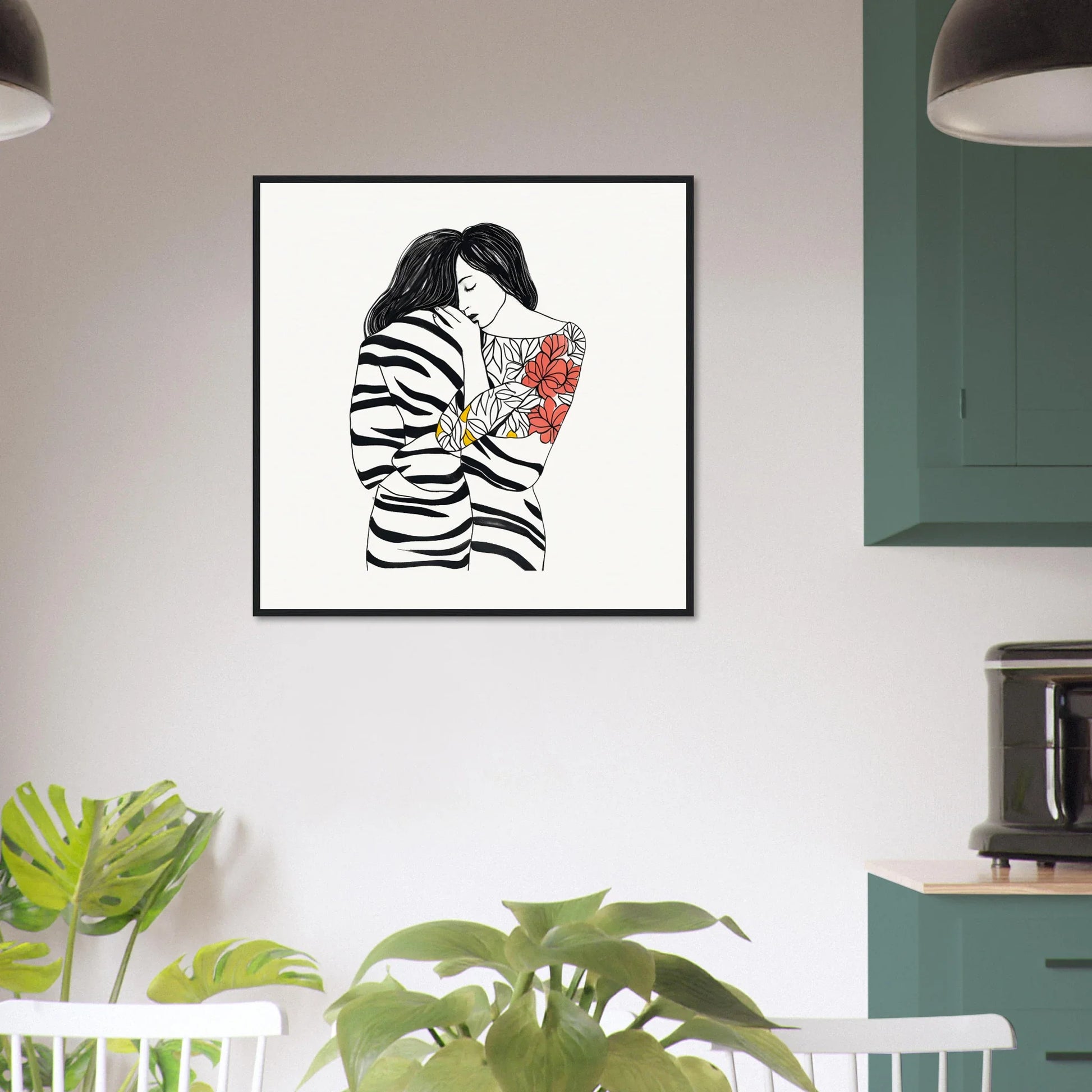 Framed black and white art of a figure in a striped sweater with red flowers for Etched Embrace Harmony