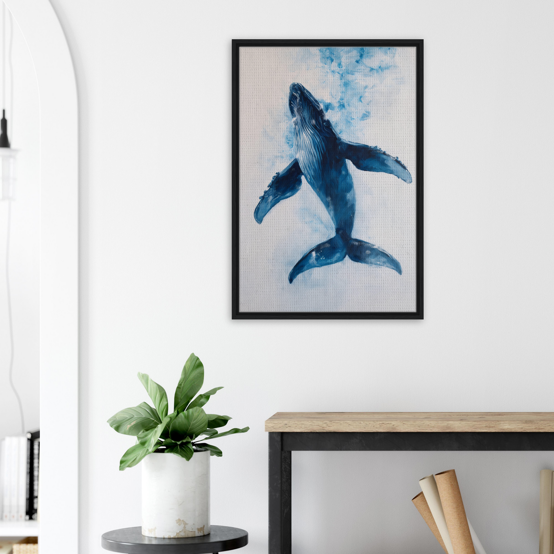 Framed canvas art of a blue whale swimming in Ethereal Ocean Voyage room decor